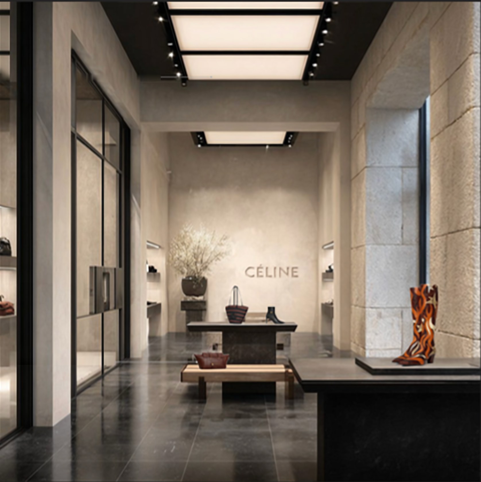 CELINE boutique entrance with a backlit light-box ceiling, black and gray granite and product display